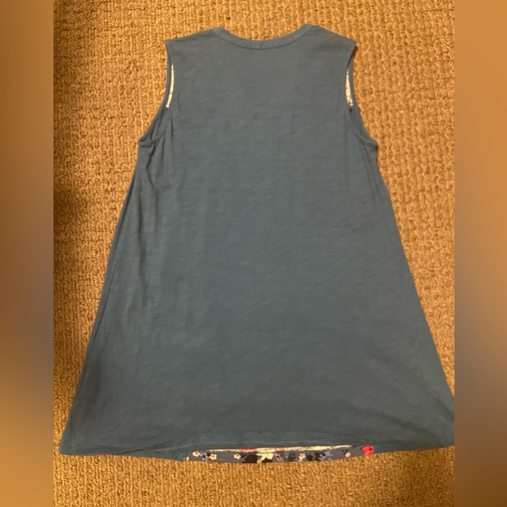 Woman With In Tank Top - Picture 8 of 9